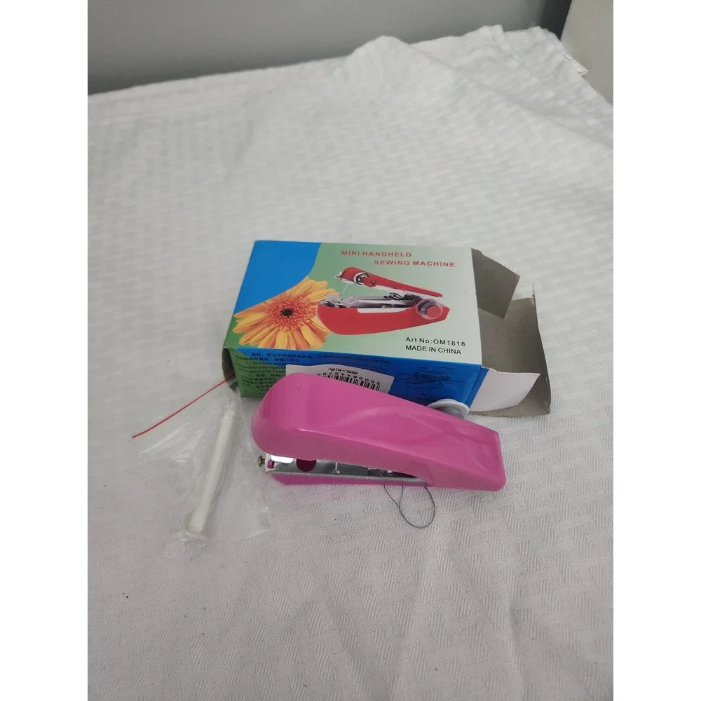 Mini Handheld Sewing Machine Pink Portable Manual Stitch Tool OM1818 New